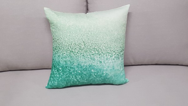 Decorative pillow speckled turquoise green